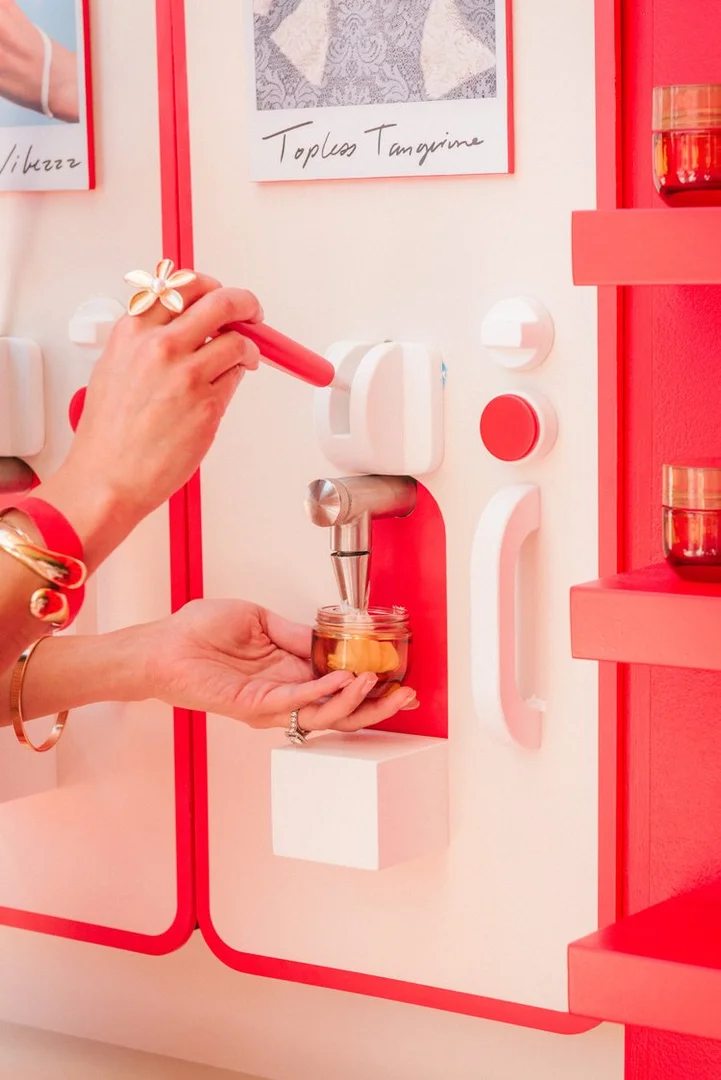 Product dispenser wall — Josie Maran California Collection